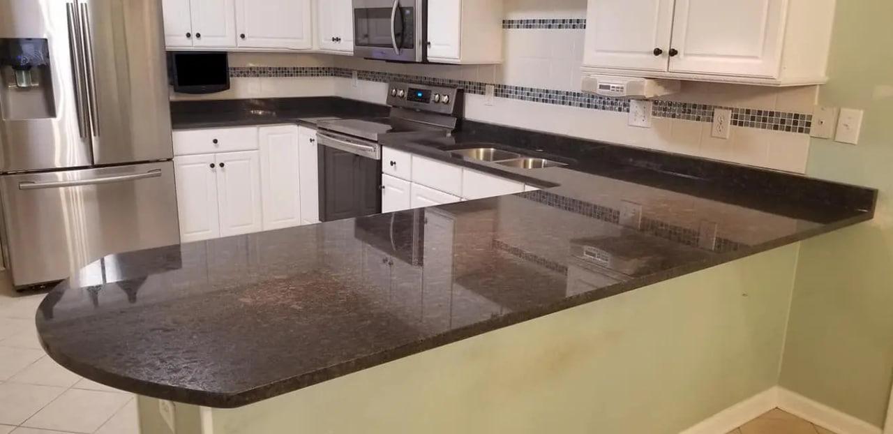 Steel Gray Granite Kitchen Countertops and Peninsula