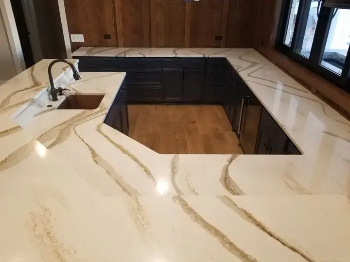 Brittanicca Gold Quartz Kitchen Island and Countertops