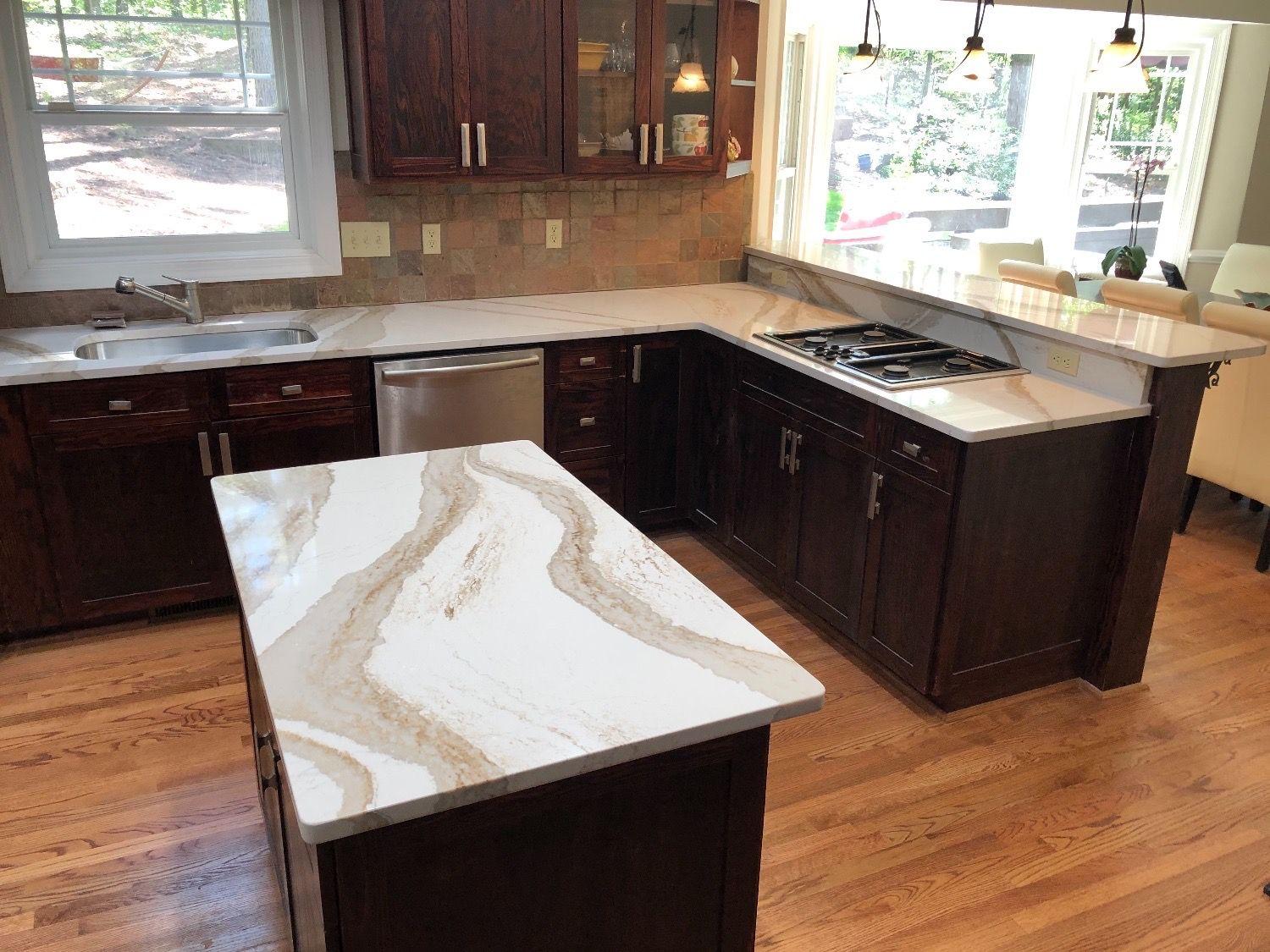 Brittanicca Gold Quartz Kitchen Island and Countertops