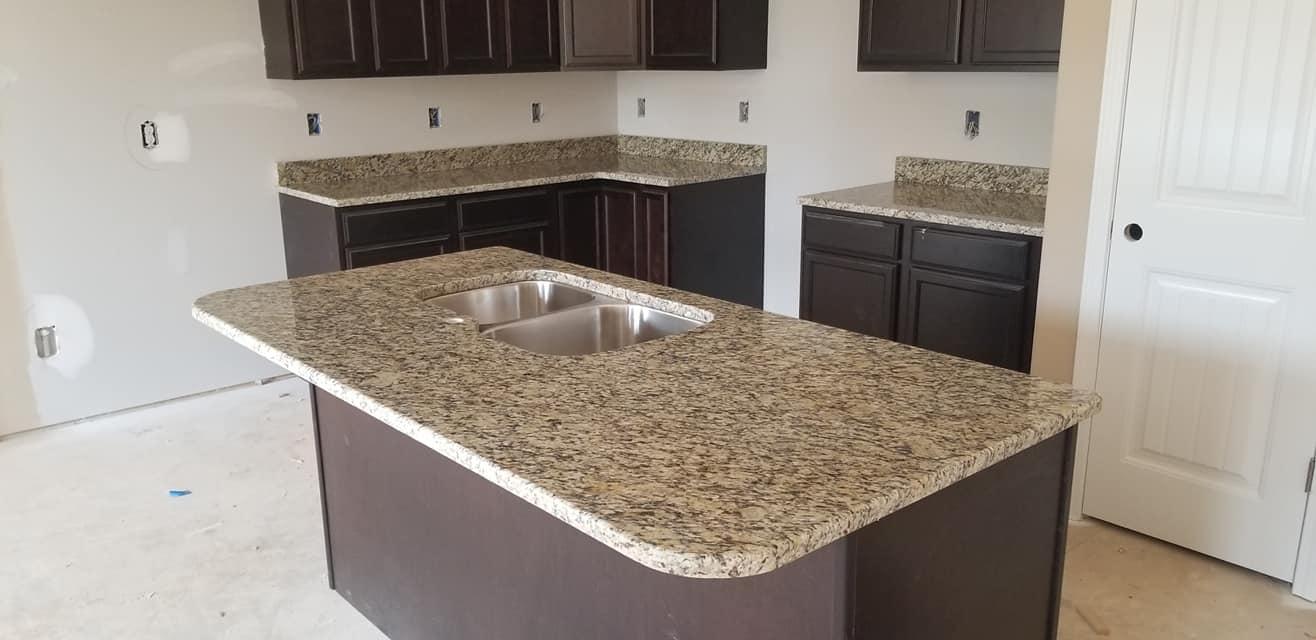 Santa Cecilia Granite kitchen island and Countertops with Brown Cabinets