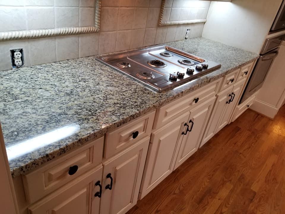 Santa Cecilia Granite Kitchen Countertops with Cream Cabinets