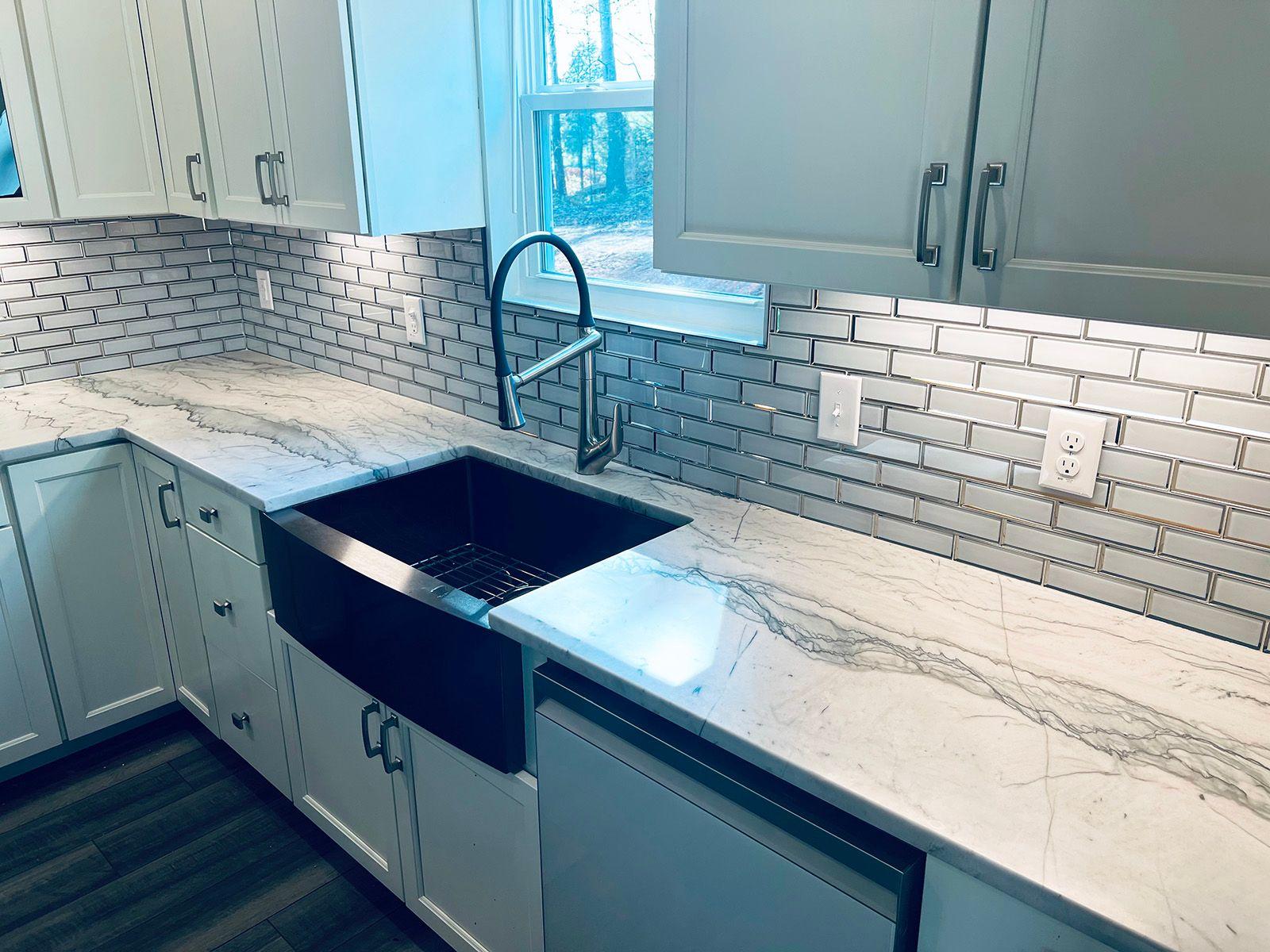 Infinity White Quartzite Countertops With Subway Tile